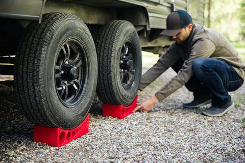 Camper Leveler Block With Rubber Mat For RVs And Trailers, Precise Leveling From One Half Inch To Four Inches, installed under tires.