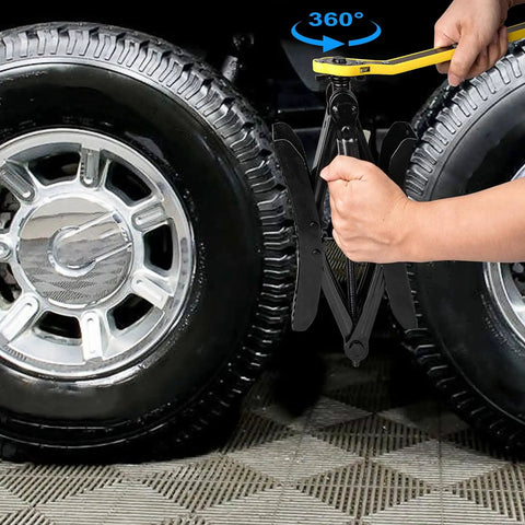 Beefy Heavy Duty Camper Wheel Chocks With Wrench For RV Travel Trailers, Premium X Shaped Tire Locking Chocks, 2 Pack, Fits 3.5 To 12 Inch Wheel Gaps, Durable Steel Construction, Gickbusus, installed between tires with wrench in use.
