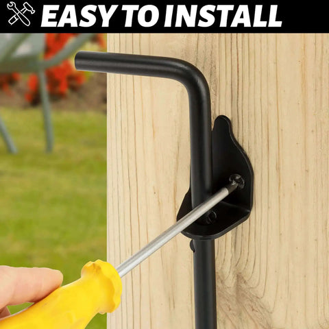 Installing 12 Inch Heavy Duty Cane Bolt Gate Drop Rod Ground Latch on wood fence with screwdriver; corrosion resistant black solid steel.