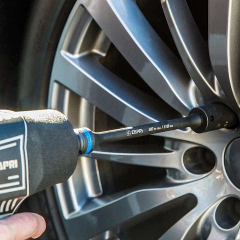 1/2 in. Drive 80 ft. lbs. Torque Limiting Extension Bar in use with impact wrench on car wheel