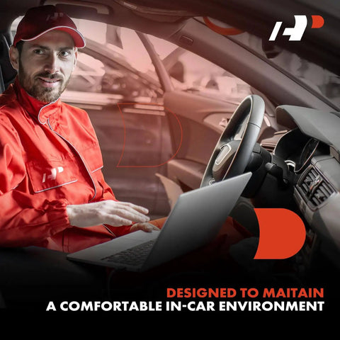 Technician with laptop testing HVAC systems in a car interior, highlighting maintenance for comfortable in-car environment.