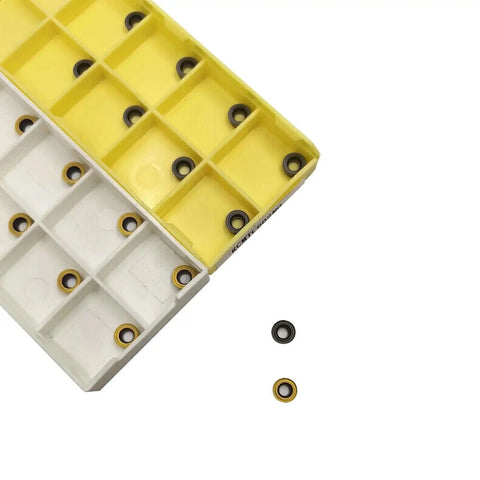 Indexable RCMT0602MO carbide inserts in yellow and white compartment case, part of the Two Piece Lathe Tool Holder Set For Half Inch Lathes