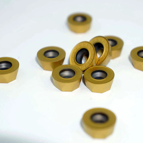 Close-up of RPMT1204 inserts from the Beefy 50mm EMR Round Dowel Face Mill Kit With Four Slot High Efficiency Cutter for multi-edge milling.