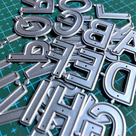 Close-up of 26 Capital Alphabet Dies Set For Metal Cutting, Card Making, Scrapbooking And DIY Embossing Projects, carbon steel letters
