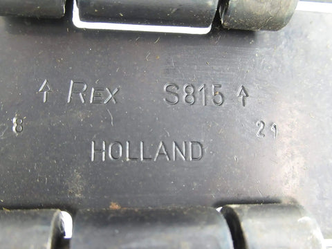 Close-up of a heavy-duty industrial chain plate with text 'Rex S815 Holland' for Table Top Carbon Steel Chain With 76 Links S815-K3-1/4 Inch for Industrial Use.