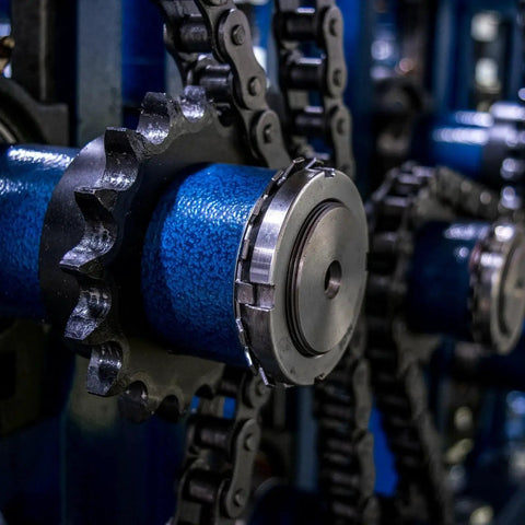 Rugged No 25 Roller Chain Sprocket For ISO 04C Chain, 16 Teeth, 15mm Bore, mounted on heavy-duty machinery setup