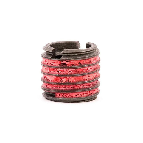 Close-up of a threaded insert from the Threaded Inserts For Metal Assortment Kit In Carbon Steel With 50 Pieces And Metric Internal Threads M3-0.5 M4-0.7 M5-0.8 M6-1.0 M8-1.25 For Repairing Damaged Threads And Reinforcing Tapped Holes In Metal, showing red and gray ringed design.