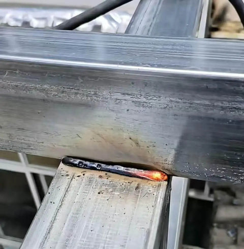 Welding process using All Position 3/32x14 Carbon Steel Welding Rod Electrodes J422 E4303 1 Lb Sticks on metal frame