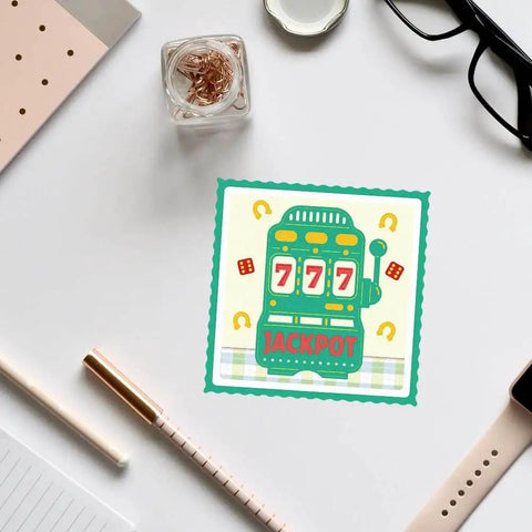 Casino Slot Machine Cutting Dies for Card Making and Scrapbooking with 777 Jackpot theme on white paper background.