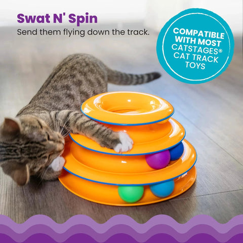 Cat playing with orange track toy and multicolor Replacement Balls for Cat Track Toys, Multiple Colors, 6 Pack, on floor
