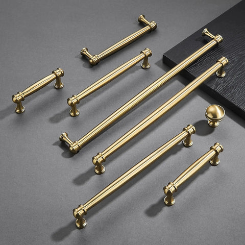 Champagne Bronze Cabinet Knobs Set of Ten, One and One Quarter Inch Round Zinc Alloy Drawer Knobs for Cabinet with matching handles shown.