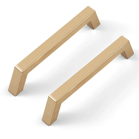 Two modern square gold cabinet pulls from the 30 Pack 5 Inch Champagne Bronze Cabinet Handles with 128 Millimeter Hole Centers.