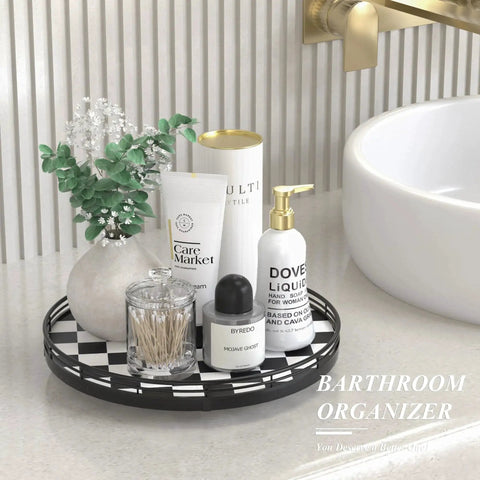 12 Inch Round Black And White Checkered Lazy Susan Turntable with bathroom essentials next to a sink.