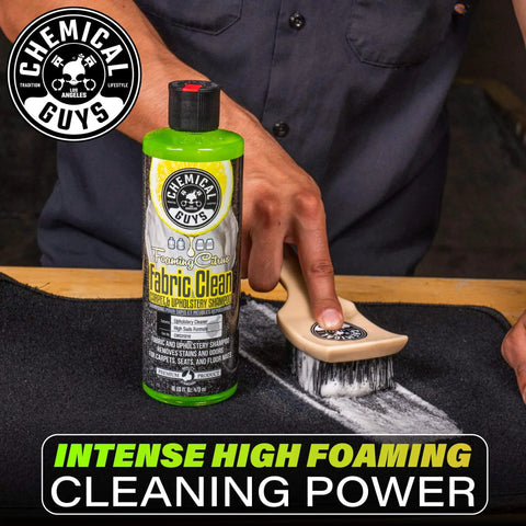 Chemical Guys Foaming Citrus Fabric Clean, Carpet and Upholstery Cleaner - 16 oz bottle being used with a brush on carpet