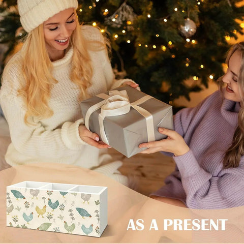 Two people exchanging gifts with a Farmhouse Chicken Wooden Utensils Holder featured as a present idea, shown in a festive setting.