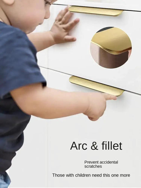 Child near cabinets with long concealed drawer edge tab pulls, modern aluminum cabinet hardware, ideal for kitchen cabinets black.