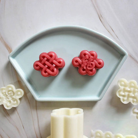 Hand Pressed Chinese Knot Cookie Molds For Flexible Plastic Pastries And Desserts 3D Pattern Baking Mold on display