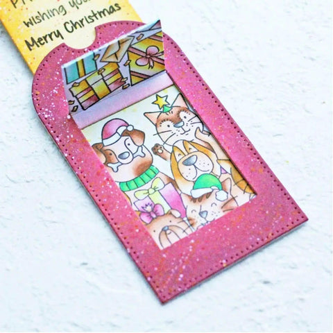 Christmas card with cartoon pets in a pink frame, showcasing 2 Sets Slider Tag Dies For Metal Cutting And Card Making For Round Tag Dies.