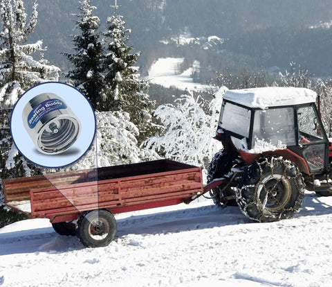 USA Made Chrome Plated Bearing Protector With 19B Bra And Blue Grease Indicator Bearing Buddy For Boats RVs, snowy trailer scene