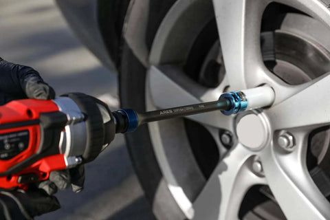 Using Foot/Pound Torque Limiting Extension Bar - Chrome Moly 1/2-Inch Drive 8-Inch Long Impact Grade Bar on car wheel