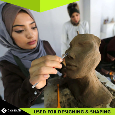 Artist uses Stainless Steel Spatula Wax And Clay Sculpting Tool Carver Set Pro Grade Double Ended for clay modeling.