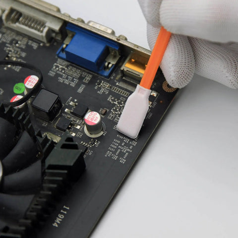 Cleaning circuit board with 10 In 1 Cleaning Swab Kit For Printer And Optics, using foam swab for precision work.