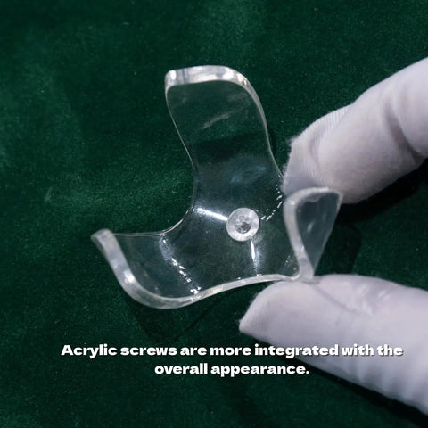 Golf Ball Wall Mount Display For Single Balls With Transparent Acrylic Claw Design held by gloved hand