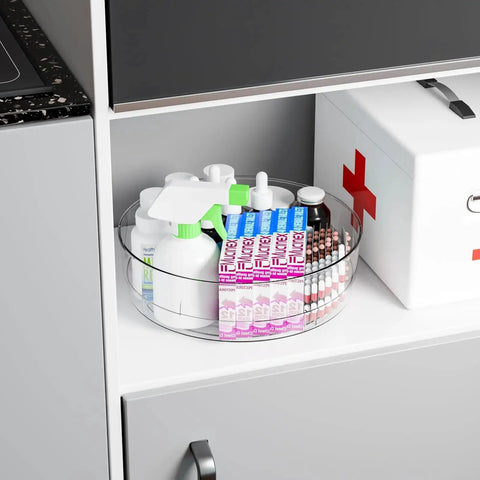 Clear 12 Inch Lazy Susan Turntable Set With Handles 4 Pack Acrylic Spinning Organizer in cabinet with medical supplies.