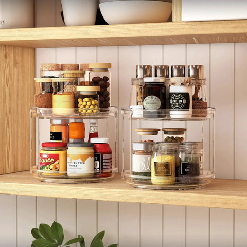 2 Pack Double Layer Lazy Susan Turntable Organizer 9.25 Inch Rotating Spice Rack, stacked and filled with spices on wooden shelf