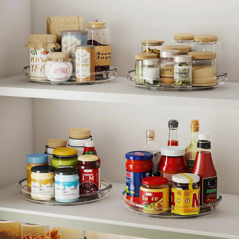 Two Pack 9.25 Inch Lazy Susan Organizer Turntable for cabinets tables pantries and refrigerators displaying jars and bottles.