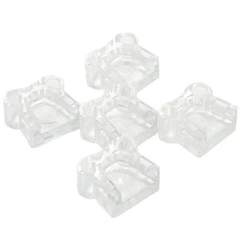 Five clear inserts from the No-Mar Tip Replacement Set for DCN Series that shields wood surfaces by snapping over nailer nose.