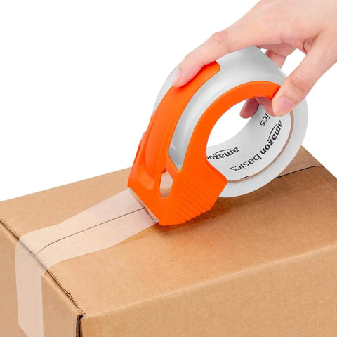 Applying Strong Clear Packaging Tape 1.88 Inch By 54.6 yd 12 Pack With Low Odor Acrylic Adhesive to a box using dispenser