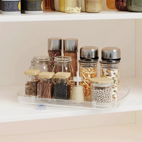 Clear Rectangular Refrigerator Lazy Susan Organizer with 360 Degree Rotation and Pullout Design on pantry shelf with jars.