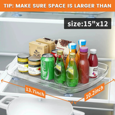 Clear Rectangular Refrigerator Lazy Susan Organizer With 360 Degree Rotation And Pullout Design holding various bottles and cans.
