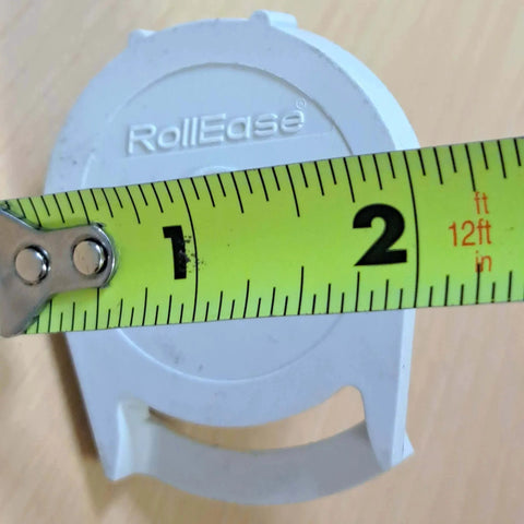 Close-up of Clutch R Series with Bead Stopper (White, R8-1" Tube) showing measurement against tape measure.