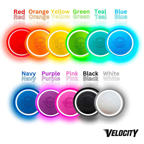 Colorful Velocity LED frisbees in red, orange, yellow, green, teal, blue, navy, purple, pink, black, and white.