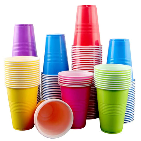 Stacks of colorful disposable plastic cups made by the Commercial Disposable Plastic Cup Making Machine All In One Thermoforming Gear