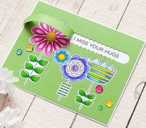 Colorful card with flowers and "I Miss Your Hugs" message using Rip Strips Frame Metal Die Cuts For DIY Scrapbooking Card Making.