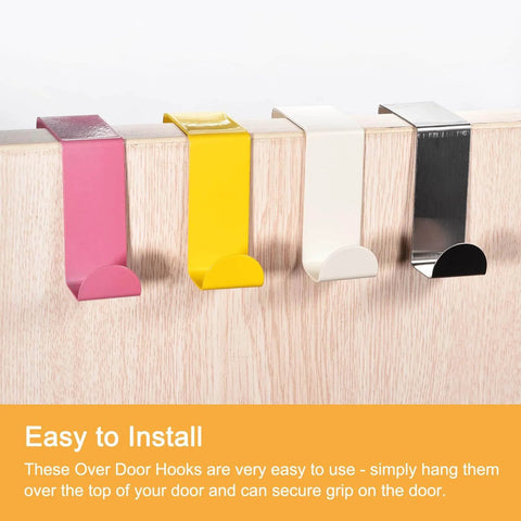 Assorted color over door hooks on wooden surface, no-drill installation for hanging clothes and accessories.