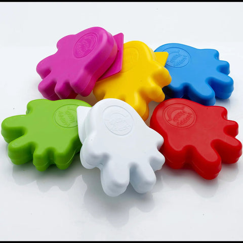Colorful plastic finger trap stoppers in various shapes with adhesive pads, not specific to Anti Slam Door Safety For Kids Two Pack Finger Trap Stoppers.