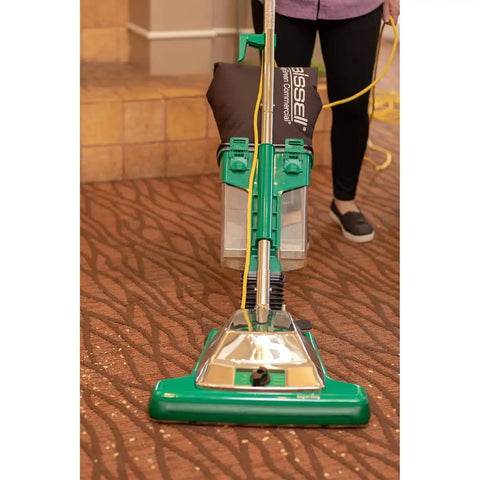 Commercial Upright Vacuum With ProCup Comfort Grip, 870W Motor, 16-Inch Cleaning Path, Easy-Empty Dirt Cup, And Magnet Bar in use