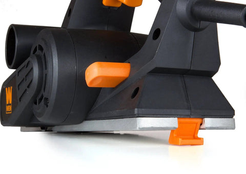 Efficient 3-1/4 inch hand planer with 6 Amp motor showing side view and cutting edge for doors, trim, and cabinetry.