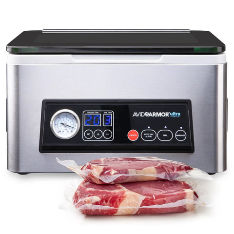 Avid Armor Ultra vacuum sealer, stainless steel body with 11.5-inch seal bar and digital panel; two raw steaks.