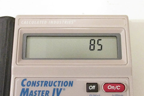 Front view of Construction Master IV Pocket Size Calculator with display showing "85", designed for feet inch fraction calculations.