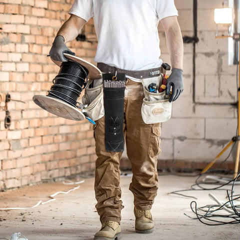 Person wearing leather tool belt with Welding Rod Holder Bundle For Arc Welding, 16 Inch Flame Resistant Leather Electrode Bag With Clip.