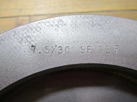 Close-up of a TB Wood's 753C style Conveyor Sheave 7.5X3C SF For Classical CB Bushing with through bore, showing part number engraving.
