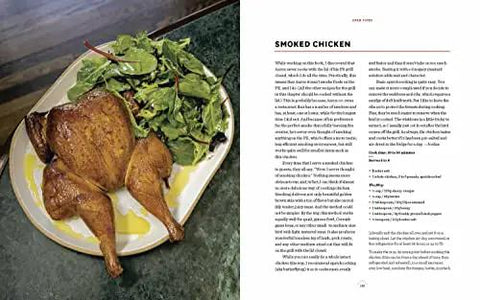 Open cookbook page showing smoked chicken recipe with greens, from Texas Style Live Fire Grilling And Smoking At Home A Cookbook.