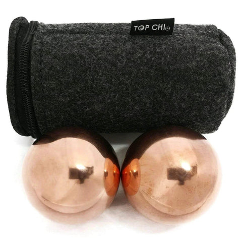 1.5 Inch Solid Copper Baoding Balls with Carry Pouch for Hand Therapy, Exercise, and Stress Relief shown with pouch