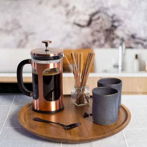 Acacia wood lazy susan organizer designed for kitchen and pantry use, rotating wooden turntable with coffee press and cups.