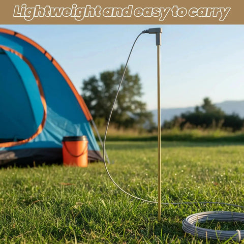 Grounding rod with 40ft wire connects your body to the earth, shown set up in a grassy field with a camping tent in the background.